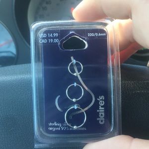 Unused. Unopened nose rings .